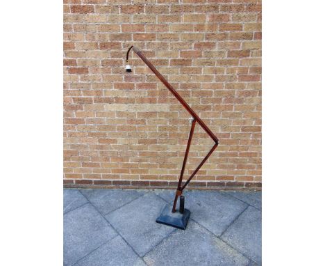 A LARGE CANTILEVERED LAMP STANDARD,  on stained pine platform base, presumably scratch-built, approx 180cm high