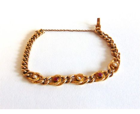 A RUBY AND SPLIT PEARL BRACELET of graduated hollow curb links, stamped '18ct' to the tongue of the hidden box clasp, the cen