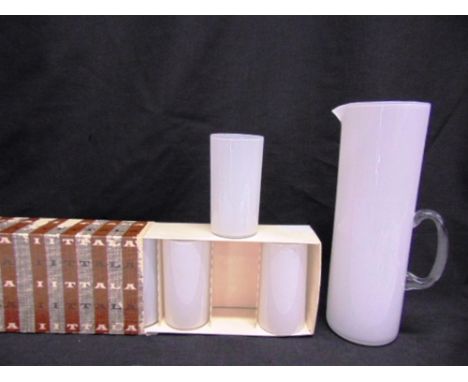 TIMO SARPANEV FOR IITTALA:  An opaque white glass lemonade set, the pitcher 29cm high, the boxed set of six beakers 12cm high