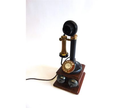 A G.P.O. NO.150 CANDLESTICK TELEPHONE circa 1921, with brass fittings, the head impressed 'I 28 / 234'; together with an asso