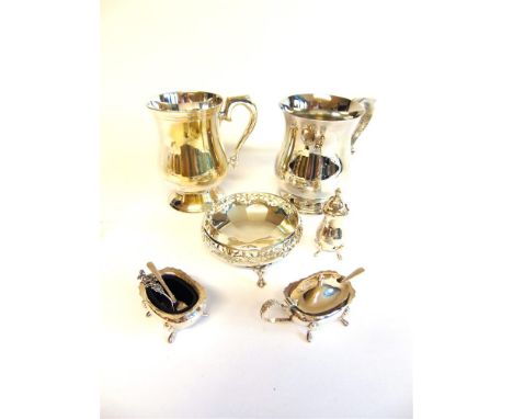 A SILVER BOWL with pierced border, on three supports, 10.5cm diameter; with a three piece silver cruet set, with liners and s
