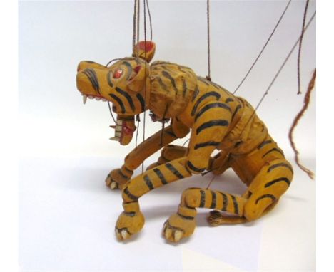 AN ASIAN PAINTED WOOD TIGER PUPPET together with a painted wood horse puppet, (2).