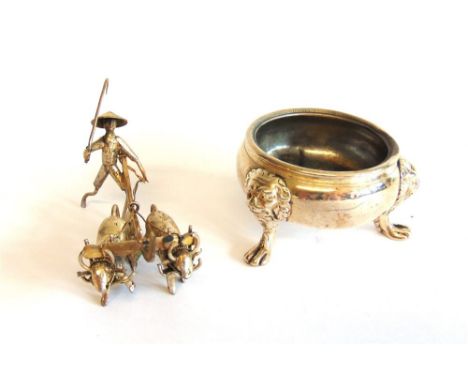 A GEORGE II SILVER SALT makers mark M.B. With a device above and pellet below, London 1738?, the bowl on lion mask supports, 