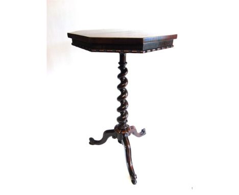 A VICTORIAN ROSEWOOD OCCASIONAL TABLE,  the octagonal top 42cm diameter, on carved spiral pillar and tripod base 73cm high