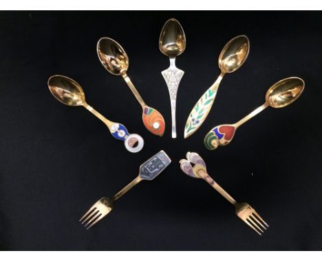 ANTON MICHELSEN, DENMARK: A GROUP OF STERLING SILVER AND ENAMEL SPOONS AND FORKS,  comprising five spoons for 1965, 1968, 196