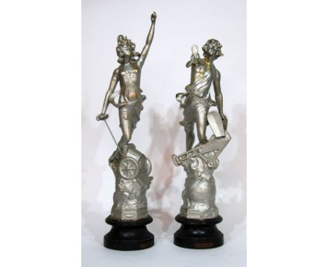 PAIR OF SPELTER FIGURES,  'Aeroplane' and 'Automobile', cast as a man and woman in stylised poses, on ebonised wooden socle b