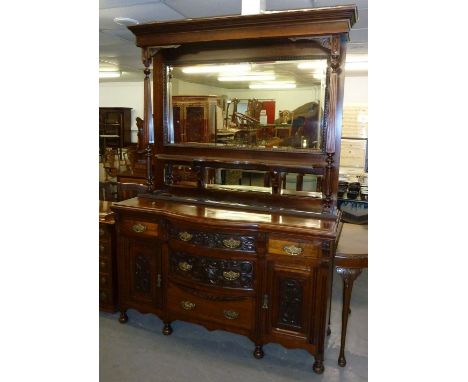 A LARGE 19TH CENTURY WALNUT AND MAHOGANY MIRROR BACK SIDEBOARD, THE RAISED BACK WITH LARGE RECTANGULAR MIRROR OVER SHAPED SHE