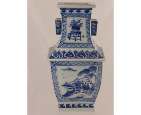A Blue and White Chinese Vase, the vase in step form depicting characters fishing, with character marks to base, approx 38 cm