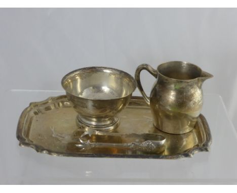 A Quantity of Poole Sterling Silver, including a card tray, sugar bowl, milk jug and some sugar nips. (4)