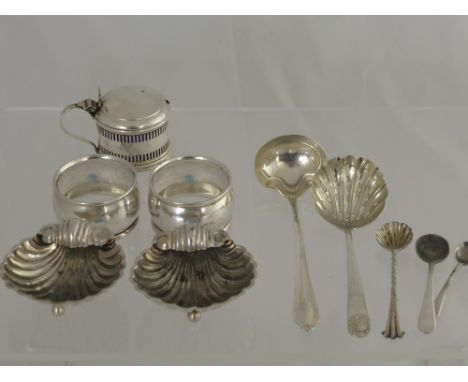 A Pair of Silver Salts, in the form of scallop shells, Birmingham hallmark dd 1905 together with two silver napkin rings Shef