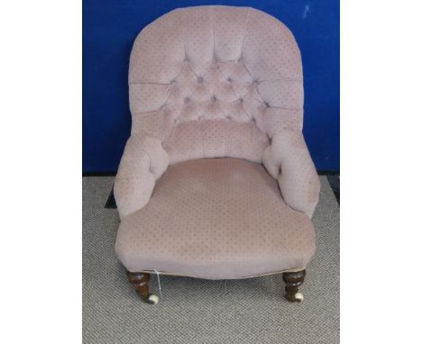 Victorian Button Back Nursery Chair, turned feet on porcelain castors.