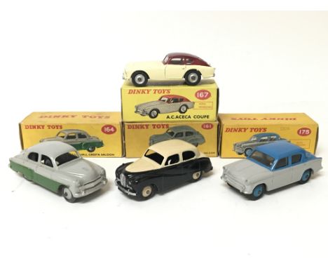 Dinky toys, #164 Vauxhall Cresta saloon, #161 Austin Somerset saloon, #167 AC Aceca coupe and #175 Hillman minx saloon, boxed