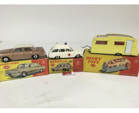 Dinky toys, #196 Holden special sedan, #278 Vauxhall Ambulance and #117 Four berth caravan, boxed