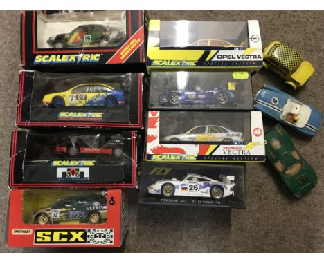 Scalextric, 11x cars of which 8 are boxed, including XR3i, Renault Laguna, Ferrari, Opel Vectra, Porsche, Venturi etc