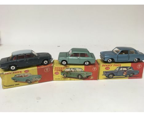 Dinky toys, #135 Triumph 2000 (playworn), #138 Hillman Imp saloon and #139 Ford Consul Cortina, boxed