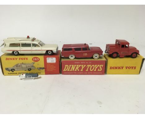 Dinky toys, #263 Superior criterion ambulance, #257 Canadian fire chiefs car and #255 Mersey tunnel police van, boxed