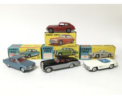 Corgi toys, #327 MGB GT, #224 Bentley Continental sports saloon, #3035 Mercedes Benz 300SL open roadster and #252 Rover 2000