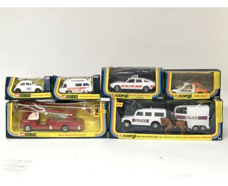 Corgi toys, Emergency services including #44 Mounted police set, #1127 Simon Snorkel fire engine, #484 AMC pacer, #373 Volksw