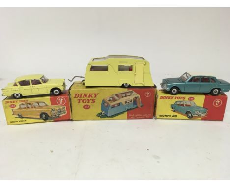 Dinky toys, #145 Singer Vogue, #117 Four berth caravan and #135 Triumph 2000, boxed