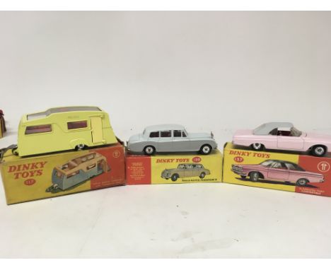 Dinky toys, #117 Four berth caravan, #198 Rolls Royce phantom V and #137 Plymouth fury convertible, boxed