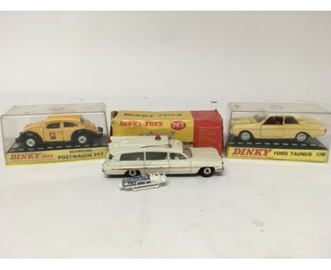 Dinky toys, #262 Schweizer post wagon PTT, #263 Superior criterion Ambulance and #154 Ford Taurus 17M, boxed