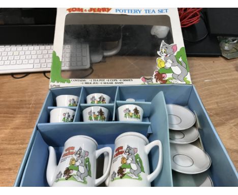 Tom and Jerry Pottery tea set, contains Tea pot, 4 cups , 4 dishes, milk jug and sugar basin, boxed