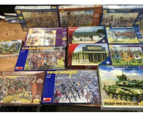 A box containing 1:72 scale , boxed models and figures including Zvezda, Perry and Mini art