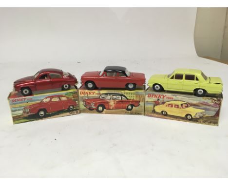 Dinky toys, #156 SAAB 96, #57/002 Corsair Monza and #151 Vauxhall Victor 101, boxed