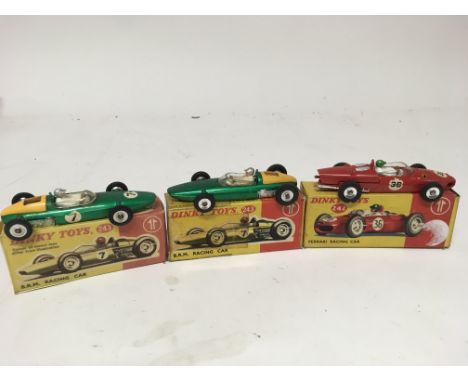 Dinky toys, #243 BRM racing car x2 and #242 Ferrari racing car, boxed