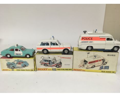 Dinky toys, #270 Ford panda police car, #254 Police patrol Land Rover and #287 Police accident unit, boxed