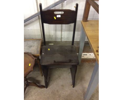 A metamorphic library step chair