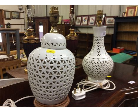 Two Oriental blanc de chine pierced table lamp bases