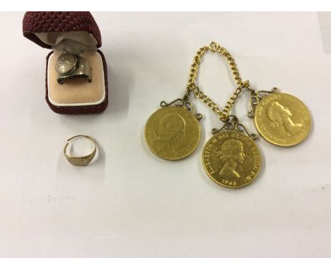 A yellow metal signet ring AF; a white metal locket ring and three gilded Churchill crowns