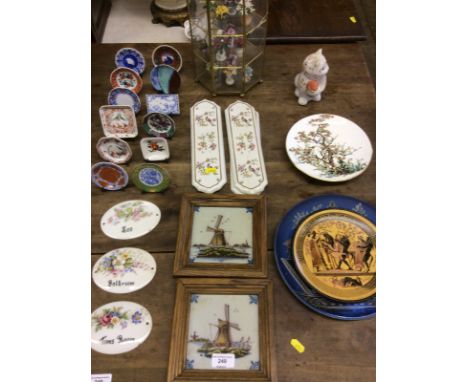 Four china finger plates; a collection of miniature porcelain plates; two framed Delft tiles; two Greek style plates; a colle