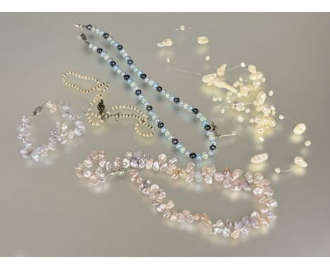 A modern Chinese freshwater cultured flattened baroque thong style necklace with silver clip fastening: l. x 21cm and matchin