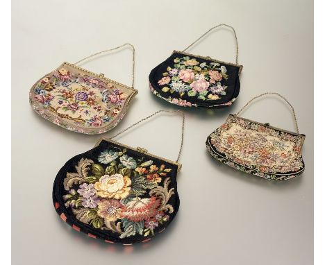A collection of four vintage tapestry evening bags with gilt metal mounts and chain straps: largest l. x 24cm smallest l. x 1