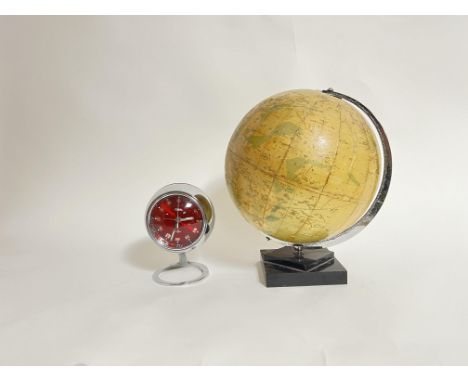 A Phillips 10 inch terrestrial globe, raised on Bakelite plinth base (h. 34cm), together with a 1950s chrome effect pedestal 