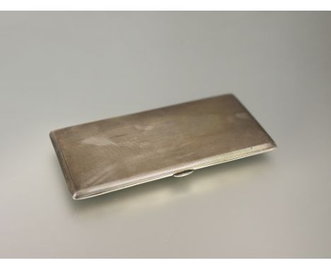 A Birmingham silver double cigarette case with engine turned decoration with internal inscription "To Watson from Margaret 19