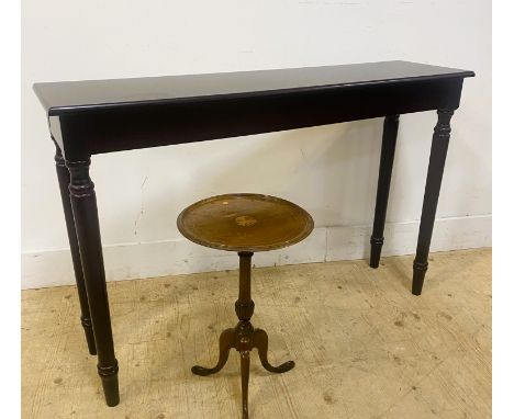A stained wood console table, with a rectangular moulded top on turned supports, 75cm x 111.5cm x 30cm, together with a mahog