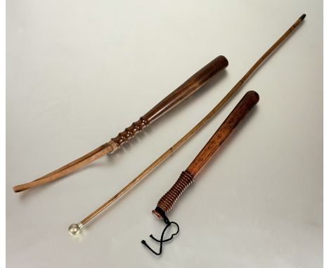 Three turned wood police truncheons together with a metal topped swagger stick (4)