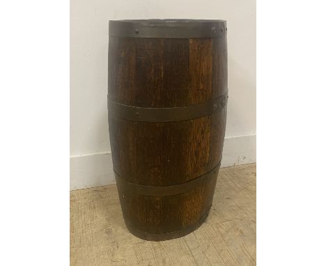 A 19th century oak and steel banded barrel, with a segmented open top for use as a stick stand, 60cm x 33cm x 27cm 