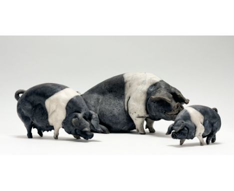 Y Christine Cummings (British, b. 1969), Seated Saddleback Pig, a large raku pottery model, incised monogram and dated June 2