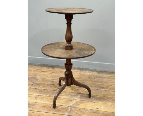 A George III mahogany two tier dumb waiter with saucer tops on vase turned double column and tripod support (h.84cm x d.48cm 