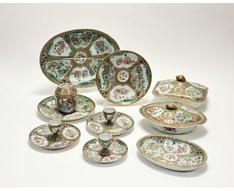 A Chinese Canton famille rose porcelain partial dinner service, 19th century, painted with alternating figural and floral car