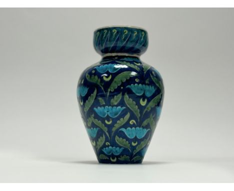 A William De Morgan Merton Abbey "Persian" vase, of baluster form with bulbous neck, painted with stylised flowers and leaves