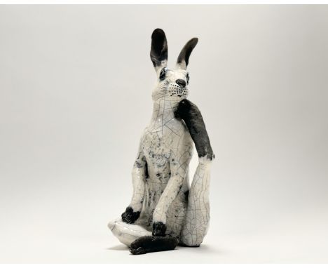 Y Lawson Rudge (British, b. 1936), Seated Hare, a raku pottery sculpture. Height 44cm. Note: Rudge trained at Stourbridge Art