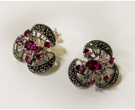 SILVER AND RUBY STUDS