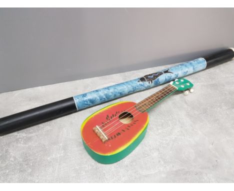 2 musical instruments both signed singer- songwriter Sam Fender by the ukulele and didgeridoo