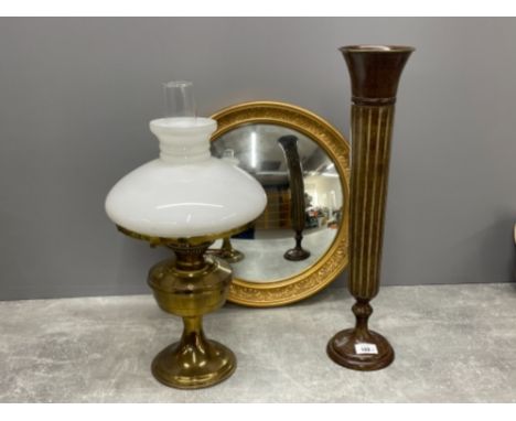 Brass lamp, gold circular mirror and vase