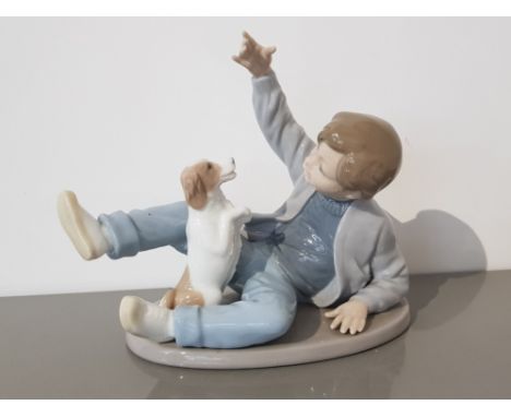 Nao by lladro figure 0278 playing with dog